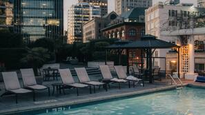 Outdoor pool, pool umbrellas, sun loungers
