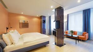 Premium bedding, free minibar, in-room safe, desk