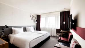 Luxe beddengoed, een minibar met enkele gratis items