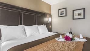 Premium bedding, blackout drapes, iron/ironing board