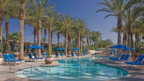 7 outdoor pools, pool umbrellas, pool loungers