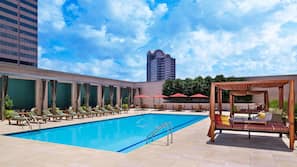 Outdoor pool, open 6:00 AM to 10:00 PM, cabanas (surcharge)