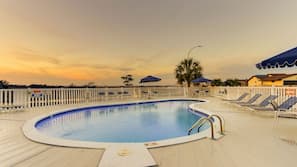 Outdoor pool, pool umbrellas, sun loungers