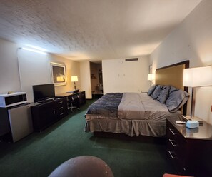 Room, 1 King Bed, Smoking | Premium bedding, down comforters, desk, iron/ironing board