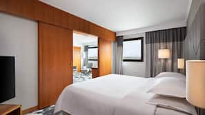 Ropa de cama hipoalergénica, minibar, caja fuerte y escritorio