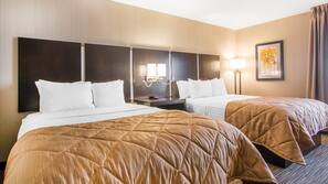 Premium bedding, desk, laptop workspace, blackout drapes