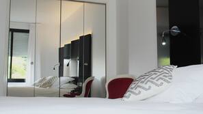 Premium bedding, desk, blackout curtains, soundproofing
