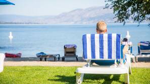 Private beach, white sand, sun-loungers, beach umbrellas