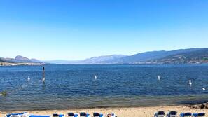 Private beach, white sand, sun-loungers, beach umbrellas