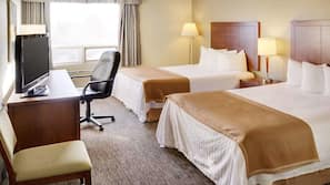 Pillowtop beds, desk, blackout drapes, iron/ironing board