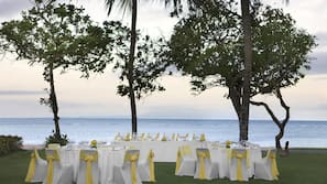 Beach nearby, white sand, beach umbrellas, beach towels