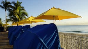 On the beach, beach cabanas, sun-loungers, beach umbrellas