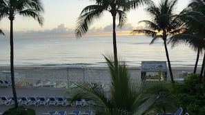 On the beach, beach cabanas, sun-loungers, beach umbrellas
