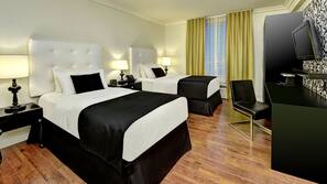 Pillowtop beds, desk, blackout drapes, iron/ironing board