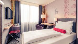 Hypo-allergenic bedding, free minibar, in-room safe, desk