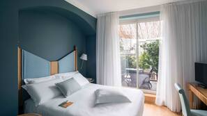 Hypo-allergenic bedding, free minibar items, in-room safe