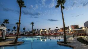 Seasonal outdoor pool, open 7:00 AM to 8:00 PM, cabanas (surcharge)