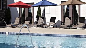 Outdoor pool, pool umbrellas, sun loungers