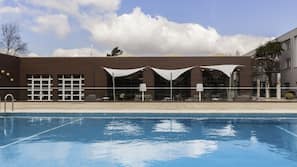 2 outdoor pools, pool umbrellas, pool loungers