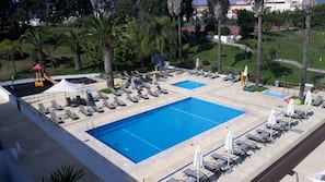 2 outdoor pools, pool umbrellas, pool loungers