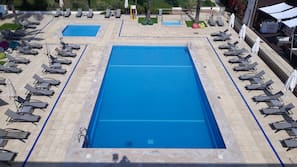 2 outdoor pools, pool umbrellas, pool loungers