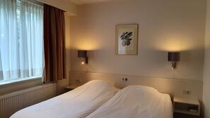 Luxe beddengoed, pillowtop-bedden, een minibar, een kluis op de kamer