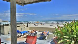 On the beach, beach towels, surfing