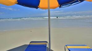 On the beach, beach towels, surfing