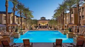 Outdoor pool, open 6 AM to 11 PM, pool umbrellas, sun loungers