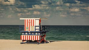 On the beach, sun-loungers, beach towels