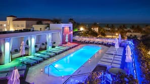 Outdoor pool, free pool cabanas, pool umbrellas