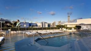 Outdoor pool, free pool cabanas, pool umbrellas
