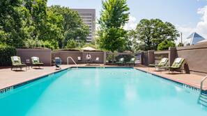 Outdoor pool, pool umbrellas, sun loungers