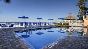 Outdoor pool, pool umbrellas, sun loungers