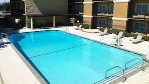 Outdoor pool, open 7:00 AM to 10:00 PM, sun loungers