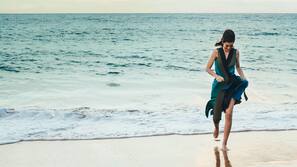 Beach nearby, white sand, rowing
