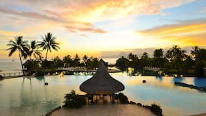 2 outdoor pools, pool umbrellas, sun loungers