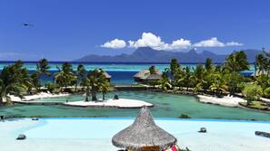 2 outdoor pools, pool umbrellas, sun loungers