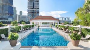 Outdoor pool, open 6:00 AM to 9:00 PM, pool umbrellas, pool loungers