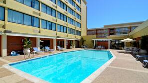 Outdoor pool, open 8 AM to 10 PM, pool umbrellas, sun loungers