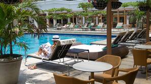 Outdoor pool, open 8 AM to 9 PM, pool umbrellas, pool loungers