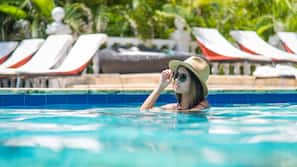 Outdoor pool, open 8 AM to 9 PM, pool umbrellas, pool loungers