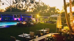 Outdoor pool, open 9:00 AM to 9:00 PM, free cabanas, pool umbrellas