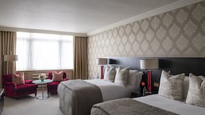 Premium bedding, pillow top beds, minibar, in-room safe