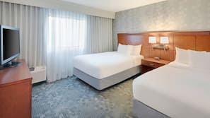 Hypo-allergenic bedding, pillowtop beds, desk, blackout drapes