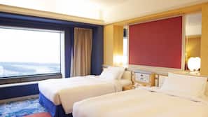 Premium bedding, down comforters, minibar, in-room safe