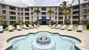 Outdoor pool, pool umbrellas, sun loungers