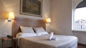 Ropa de cama de alta calidad, minibar, caja fuerte y escritorio
