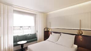 Luxe beddengoed, donzen dekbedden, traagschuim, een minibar