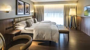 Hypo-allergenic bedding, down comforters, minibar, in-room safe